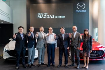 Representatives of Eurokars Group and Mazda Motor Corporation pose for group photo at the Exclusive Media Showcase of the All-New Mazda3 in Singapore