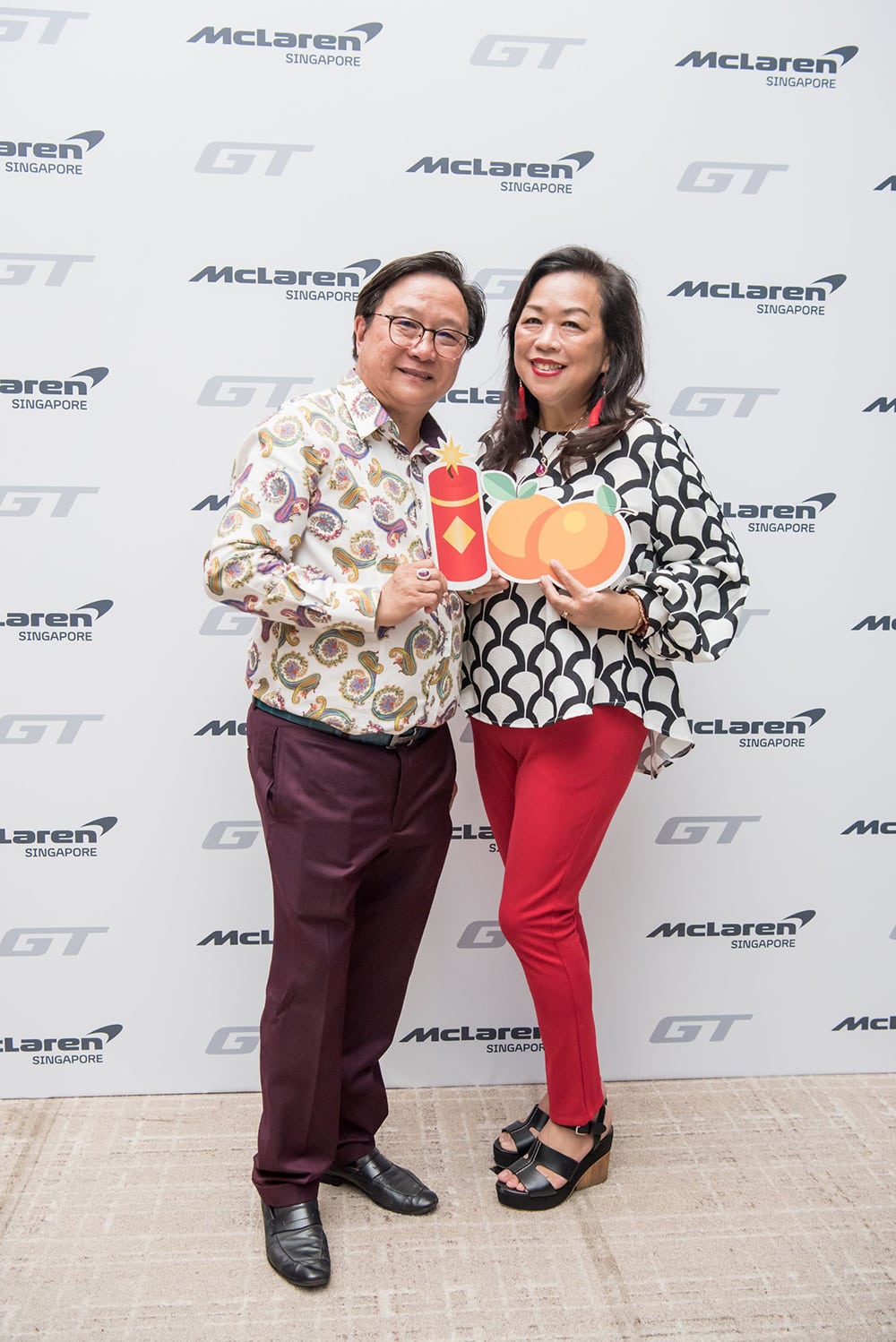 McLaren guests Mr Frankie Choo & Mrs Alice Choo posing for the camera